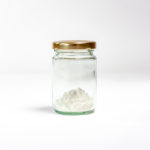 dushey CBD Isolate 99% powder sample in small jar